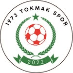 1973 Tokmak Spor arması — yeşil çelenk, yıldız ve kırmızı-beyaz top